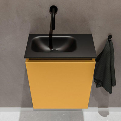MONDIAZ TURE Toiletmeubel 40x23x50cm met 0 kraangaten 1 deuren ocher mat Wastafel Eden links Solid Surface Zwart