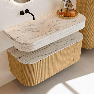 MONDIAZ THOR-DLUX 110cm badmeubel ronding links + rechts kleur Oak met 1 lade en 2 deuren. Vrijhangende wastafel CLOUD Links zonder kraangat kleur Nata.
