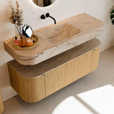 MONDIAZ THOR-DLUX 130cm badmeubel ronding links + rechts kleur Oak met 1 lade en 2 deuren. Vrijhangende wastafel CLOUD Midden zonder kraangat kleur Arena.