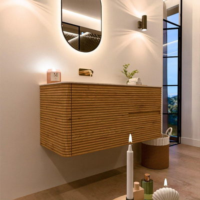 Mondiaz CIRO-DLUX Meuble de salle de bains - 110x45x50cm - Plan vasque solid surface Meli - 1 bassin à gauche - sans trous de robinet - 2 tiroirs - Chêne