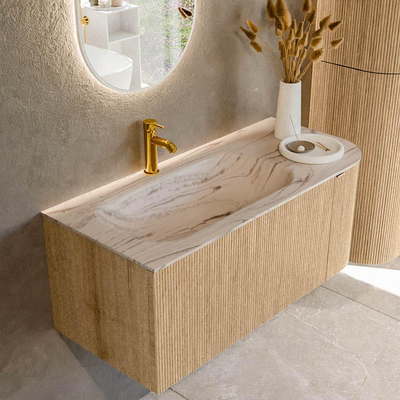 MONDIAZ KURVE-DLUX 105cm badmeubel ronding Rechts kleur Oak met 1 lade en 1 deur. Wastafel BIG SMALL Links 1 kraangat Nata.