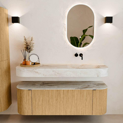 MONDIAZ THOR-DLUX 140cm badmeubel ronding links + rechts kleur Oak met 1 lade en 2 deuren. Vrijhangende wastafel CLOUD Rechts zonder kraangat kleur Frappe.