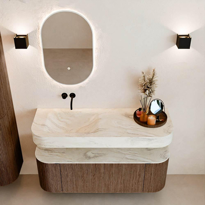 MONDIAZ THOR-DLUX 130cm badmeubel ronding links + rechts kleur Walnut met 1 lade en 2 deuren. Vrijhangende wastafel CLOUD Links zonder kraangat kleur Ostra.