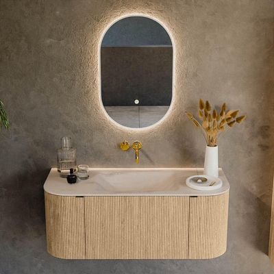 MONDIAZ KURVE-DLUX 110cm badmeubel ronding Links + Rechts kleur Oak met 1 lade en 2 deuren. Wastafel CLOUD Midden zonder kraangat Meli.