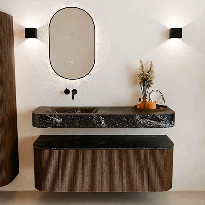 MONDIAZ THOR-DLUX 130cm badmeubel ronding links + rechts kleur Walnut met 1 lade en 2 deuren. Vrijhangende wastafel CLOUD Links zonder kraangat kleur Lava.