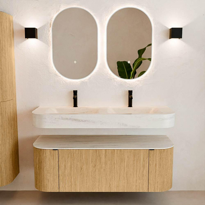 MONDIAZ THOR-DLUX 130cm badmeubel ronding links + rechts kleur Oak met 1 lade en 2 deuren. Vrijhangende wastafel CLOUD Dubbel 2 kraangaten kleur Meli.