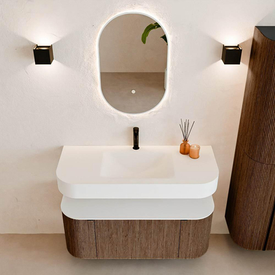 MONDIAZ THOR Meuble de salle de bains 110cm arrondi gauche + droite couleur Walnut avec 1 tiroir et 2 portes. Vasque suspendue CLOUD Milieu 1 trou de robinet couleur Talc.