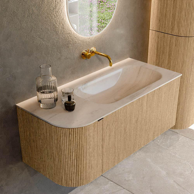 MONDIAZ KURVE-DLUX 105cm badmeubel ronding Links kleur Oak met 1 lade en 1 deur. Wastafel BIG SMALL Rechts zonder kraangat Meli.
