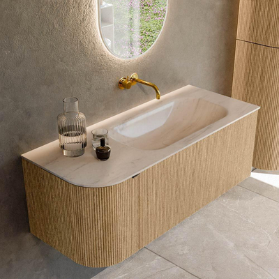 MONDIAZ KURVE-DLUX 115cm badmeubel ronding Links kleur Oak met 1 lade en 1 deur. Wastafel BIG SMALL Rechts zonder kraangat Meli.