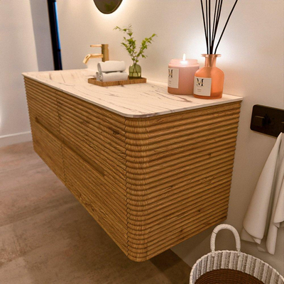 Mondiaz CIRO-DLUX Meuble de salle de bains - 130x45x50cm - Vasque en solid surface Nata - 1 lavabo à gauche - 1 trou de robinetterie - 4 tiroirs - Chêne