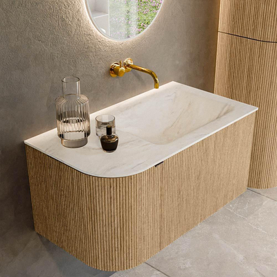 MONDIAZ KURVE-DLUX meuble de salle de bains 85 cm avec module 25 L couleur Oak avec 1 tiroir et 1 porte. Lavabo CLOUD à droite sans trou de robinet couleur Ostra.