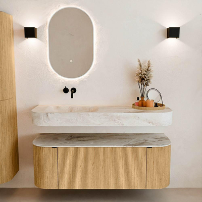 MONDIAZ THOR-DLUX 130cm meuble de salle de bains arrondi gauche + droite couleur Oak avec 1 tiroir et 2 portes. Vasque suspendue CLOUD Gauche sans trou de robinet couleur Frappe.