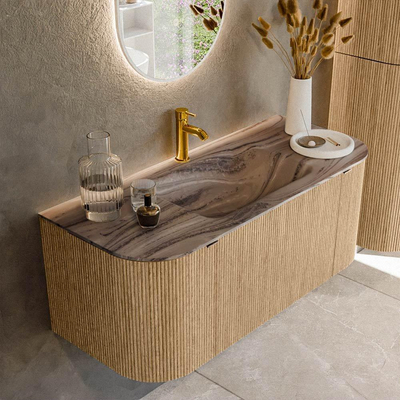 MONDIAZ KURVE-DLUX Meuble de salle de bains 110cm arrondi Gauche + Droite couleur Oak avec 1 tiroir et 2 portes. Lavabo CLOUD Central 1 trou de robinet Sombra.
