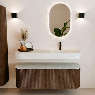 MONDIAZ THOR-DLUX 130cm badmeubel ronding links + rechts kleur Walnut met 1 lade en 2 deuren. Vrijhangende wastafel CLOUD Rechts 1 kraangat kleur Opalo.