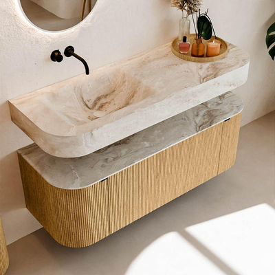 MONDIAZ THOR-DLUX 130cm badmeubel ronding links + rechts kleur Oak met 1 lade en 2 deuren. Vrijhangende wastafel CLOUD Links zonder kraangat kleur Frappe.