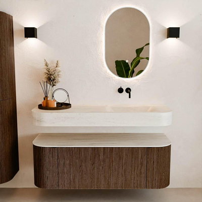 MONDIAZ THOR-DLUX 130cm badmeubel ronding links + rechts kleur Walnut met 1 lade en 2 deuren. Vrijhangende wastafel CLOUD Rechts zonder kraangat kleur Meli.