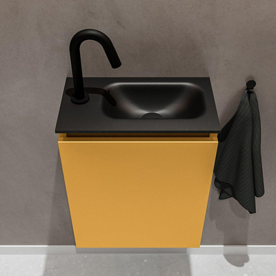 MONDIAZ TURE Toiletmeubel 40x23x50cm met 1 kraangaten 1 deuren ocher mat Wastafel Eden rechts Solid Surface Zwart