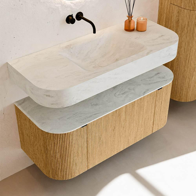 MONDIAZ THOR-DLUX 110cm badmeubel ronding links + rechts kleur Oak met 1 lade en 2 deuren. Vrijhangende wastafel CLOUD Midden zonder kraangat kleur Opalo.
