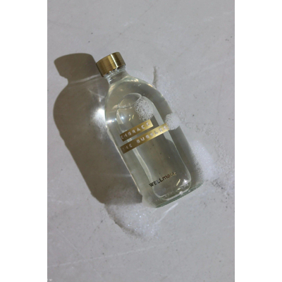 Wellmark Savon de bain verre transparent bouchon en laiton flacon 500ml texte EMBRACE THE BUBBLES