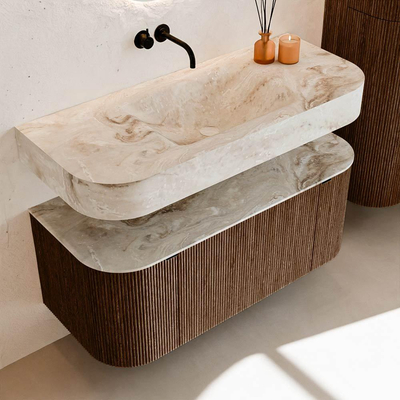 MONDIAZ THOR-DLUX 110cm badmeubel ronding links + rechts kleur Walnut met 1 lade en 2 deuren. Vrijhangende wastafel CLOUD Midden zonder kraangat kleur Frappe.