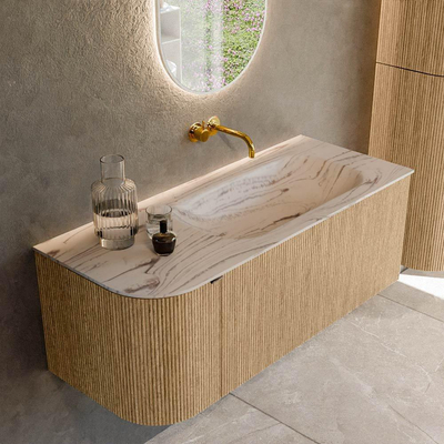 MONDIAZ KURVE-DLUX 115cm badmeubel ronding Links kleur Oak met 1 lade en 1 deur. Wastafel BIG SMALL Rechts zonder kraangat Nata.