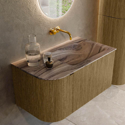 MONDIAZ KURVE-DLUX Meuble de salle de bains 85 cm arrondi à gauche couleur Dusk avec 1 tiroir et 1 porte. Plan-vasque CLOUD à droite sans trou de robinetterie Sombra.