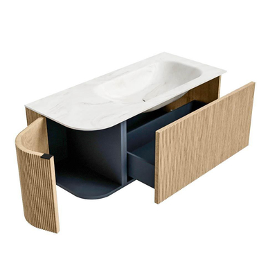 MONDIAZ KURVE-DLUX meuble de salle de bains 105 cm avec module 25 L couleur Oak avec 1 tiroir et 1 porte. Plan-vasque BIG SMALL à droite sans trou de robinetterie couleur Ostra.
