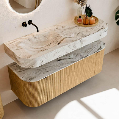 MONDIAZ THOR-DLUX 130cm badmeubel ronding links + rechts kleur Oak met 1 lade en 2 deuren. Vrijhangende wastafel CLOUD Links zonder kraangat kleur Glace.