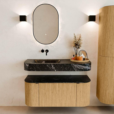 MONDIAZ THOR-DLUX 110cm badmeubel ronding links + rechts kleur Oak met 1 lade en 2 deuren. Vrijhangende wastafel CLOUD Links zonder kraangat kleur Lava.