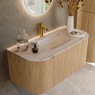 MONDIAZ KURVE-DLUX 100cm meuble de salle de bains arrondi Gauche + Droite couleur Chêne avec 1 tiroir et 2 portes. Lavabo GRUNNE Central 1 trou de robinet Nata.