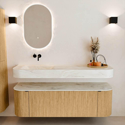 MONDIAZ THOR-DLUX 150cm badmeubel ronding links + rechts kleur Oak met 1 lade en 2 deuren. Vrijhangende wastafel CLOUD Links zonder kraangat kleur Ostra.