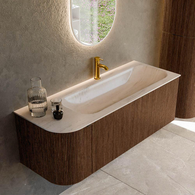 MONDIAZ KURVE-DLUX meuble de salle de bain 125 cm arrondi à gauche couleur noyer avec 1 tiroir et 1 porte. Lavabo BIG MEDIUM à droite 1 trou de robinet Meli.