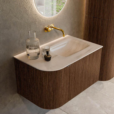 MONDIAZ KURVE-DLUX 75cm badmeubel ronding Links kleur Walnut met 1 lade en 1 deur. Wastafel GRUNNE Rechts zonder kraangat Meli.