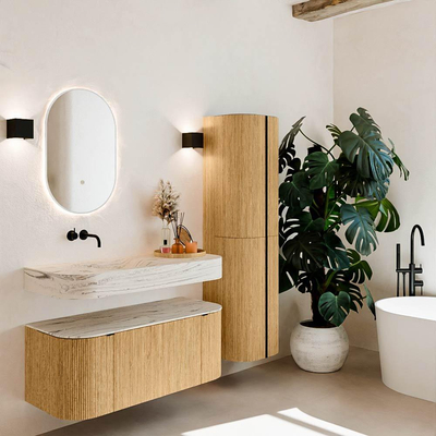 MONDIAZ THOR-DLUX 110cm badmeubel ronding links + rechts kleur Oak met 1 lade en 2 deuren. Vrijhangende wastafel CLOUD Links zonder kraangat kleur Nata.