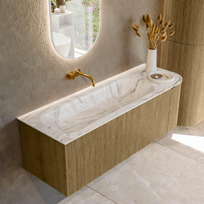 Mondiaz KURVE-DLUX Ensemble de meuble de salle de bains - 135x46x40cm - 1 tiroir - 1 porte - lavabo solid surface - gauche - sans trou de robinet - Dusk