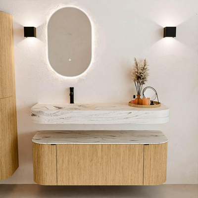 MONDIAZ THOR-DLUX 130cm meuble de salle de bains arrondi gauche + droite couleur Oak avec 1 tiroir et 2 portes. Vasque suspendue CLOUD gauche 1 trou de robinet couleur Nata.