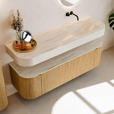 MONDIAZ THOR-DLUX 150cm badmeubel ronding links + rechts kleur Oak met 1 lade en 2 deuren. Vrijhangende wastafel CLOUD Rechts zonder kraangat kleur Meli.