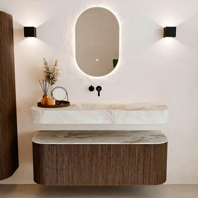 MONDIAZ THOR-DLUX 130cm badmeubel ronding links + rechts kleur Walnut met 1 lade en 2 deuren. Vrijhangende wastafel CLOUD Midden zonder kraangat kleur Frappe.