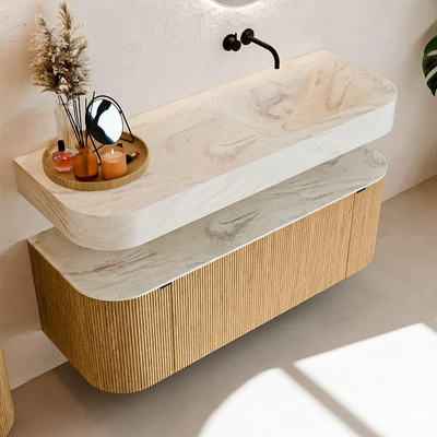 MONDIAZ THOR-DLUX 130cm badmeubel ronding links + rechts kleur Oak met 1 lade en 2 deuren. Vrijhangende wastafel CLOUD Rechts zonder kraangat kleur Ostra.