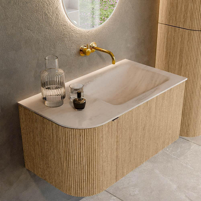 MONDIAZ KURVE-DLUX Meuble de salle de bains 85cm arrondi à gauche couleur Chêne avec 1 tiroir et 1 porte. Lavabo CLOUD à droite sans trou de robinet Meli.