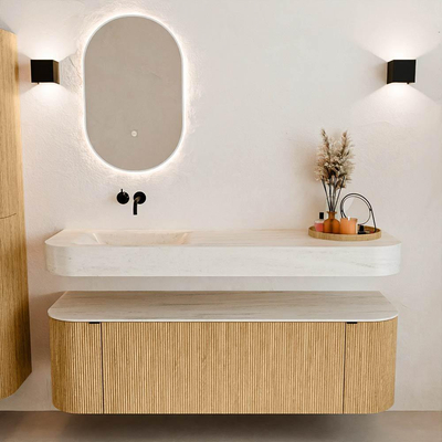 MONDIAZ THOR-DLUX 150cm badmeubel ronding links + rechts kleur Oak met 1 lade en 2 deuren. Vrijhangende wastafel CLOUD Links zonder kraangat kleur Meli.