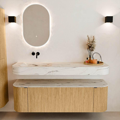 MONDIAZ THOR-DLUX 150cm badmeubel ronding links + rechts kleur Oak met 1 lade en 2 deuren. Vrijhangende wastafel CLOUD Links zonder kraangat kleur Nata.