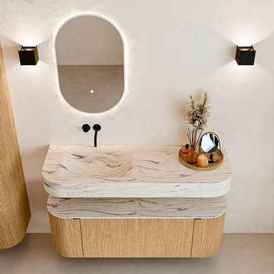 MONDIAZ THOR-DLUX 130cm badmeubel ronding links + rechts kleur Oak met 1 lade en 2 deuren. Vrijhangende wastafel CLOUD Links zonder kraangat kleur Nata.
