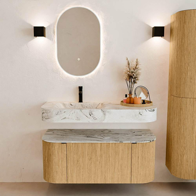 MONDIAZ THOR-DLUX 110cm badmeubel ronding links + rechts kleur Oak met 1 lade en 2 deuren. Vrijhangende wastafel CLOUD Links 1 kraangat kleur Glace.