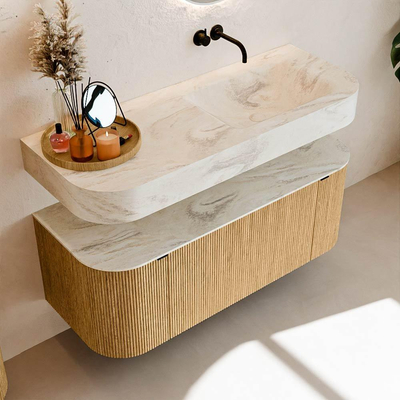 MONDIAZ THOR-DLUX 120cm badmeubel ronding links + rechts kleur Oak met 1 lade en 2 deuren. Vrijhangende wastafel CLOUD Rechts zonder kraangat kleur Ostra.