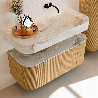 MONDIAZ THOR-DLUX 110cm badmeubel ronding links + rechts kleur Oak met 1 lade en 2 deuren. Vrijhangende wastafel CLOUD Rechts zonder kraangat kleur Frappe.