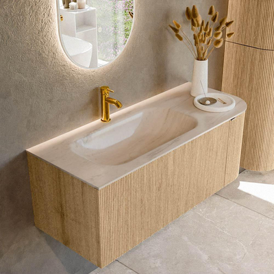 MONDIAZ KURVE-DLUX 115cm badmeubel ronding Rechts kleur Oak met 1 lade en 1 deur. Wastafel BIG SMALL Links 1 kraangat Meli.