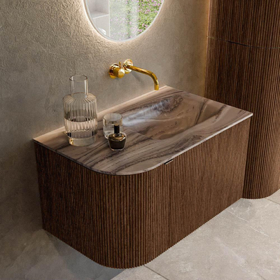 MONDIAZ KURVE-DLUX Meuble de salle de bains 75cm courbe à gauche couleur Walnut avec 1 tiroir et 1 porte. Lavabo GRUNNE à droite sans trou de robinet Sombra.