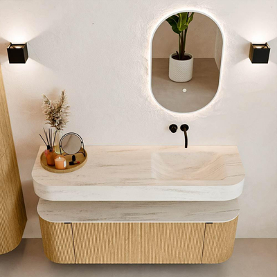MONDIAZ THOR-DLUX 140cm badmeubel ronding links + rechts kleur Oak met 1 lade en 2 deuren. Vrijhangende wastafel CLOUD Rechts zonder kraangat kleur Meli.
