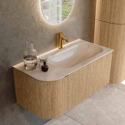 MONDIAZ KURVE-DLUX meuble de salle de bains 95cm courbe à gauche couleur chêne avec 1 tiroir et 1 porte. Lavabo BIG SMALL à droite 1 trou de robinet Meli.